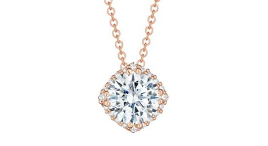 a round cut diamond pendant necklace in rose gold