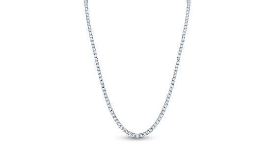 a long, silver tennis necklaces lines with sparkling diamonds