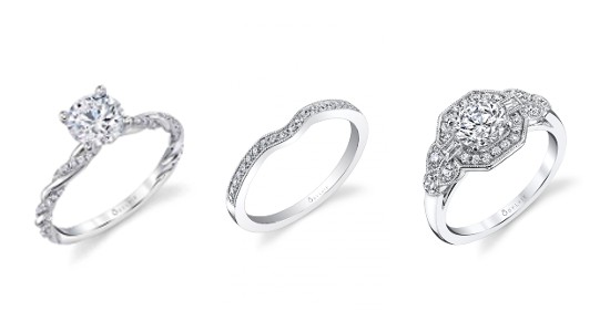 two engagement rings and a curved wedding band by Sylvie